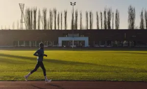 Athlete training outdoors on a track
